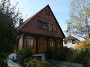 Гостиница Ferienwohnung am Teich  Гросшёнау